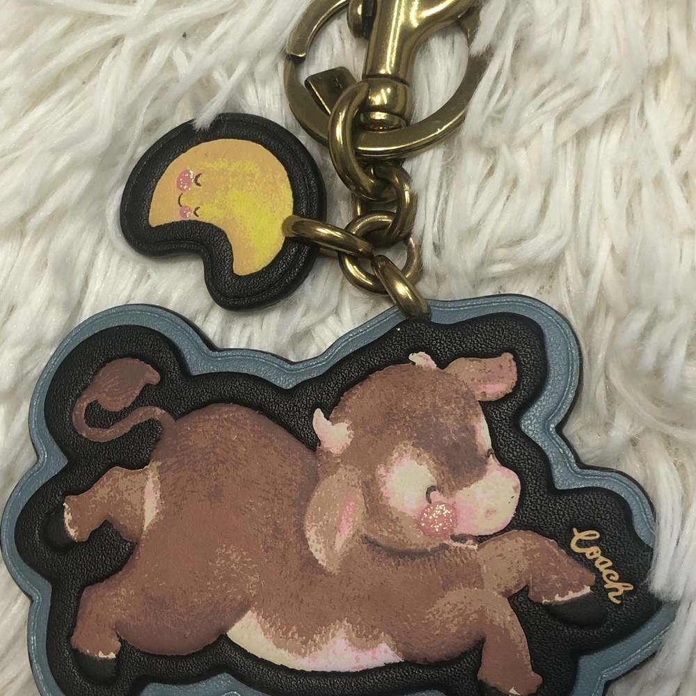 coach cow keychain bag charm